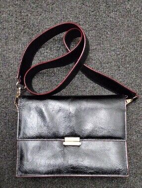 Tusk Black Shoulder/Crossbody Bag with Red-Trim